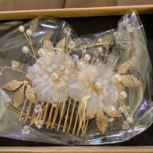 Bridal floral hair clip.